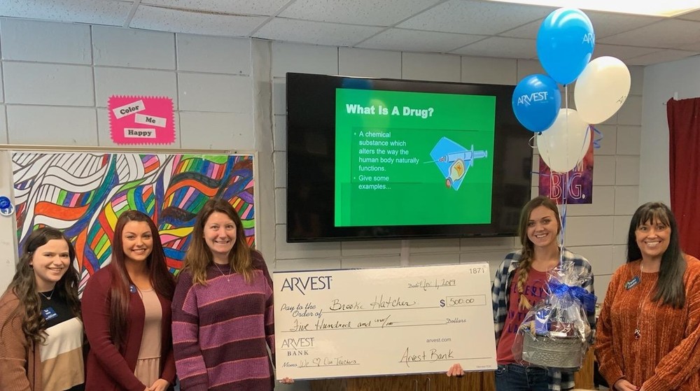 Arvest Surprises PMS Teacher with $500